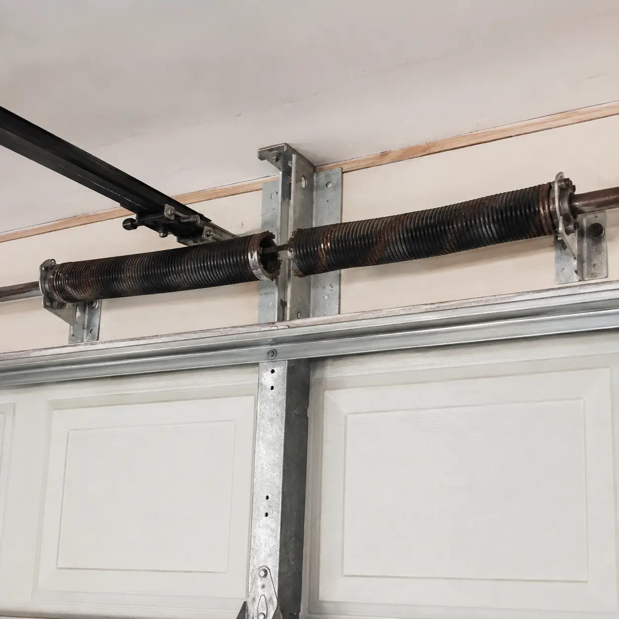 Garage door spring system before professional inspection in Lawrence